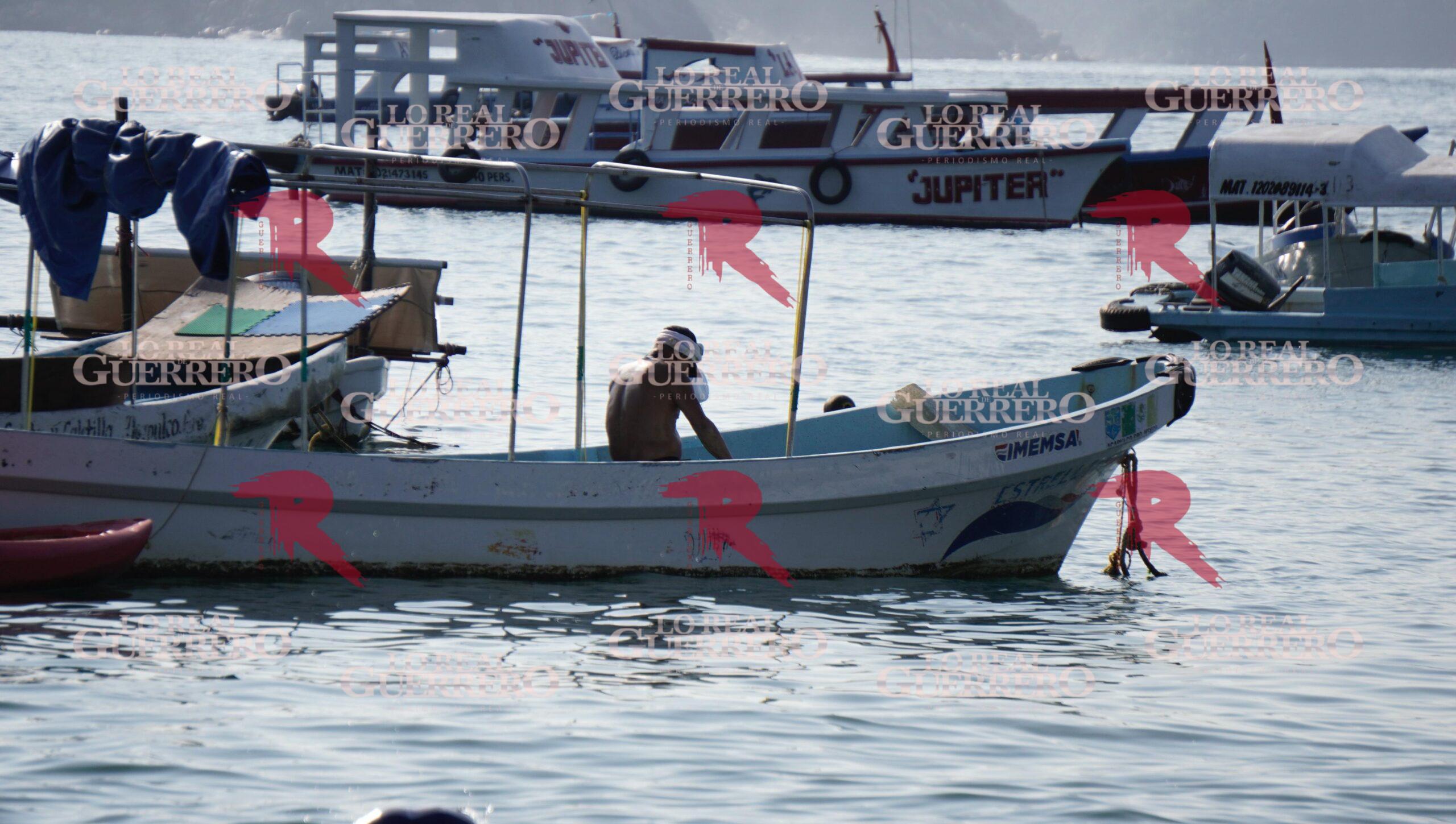 Lluvias dejan daños en embarcaciones de Acapulco y playa Caletilla